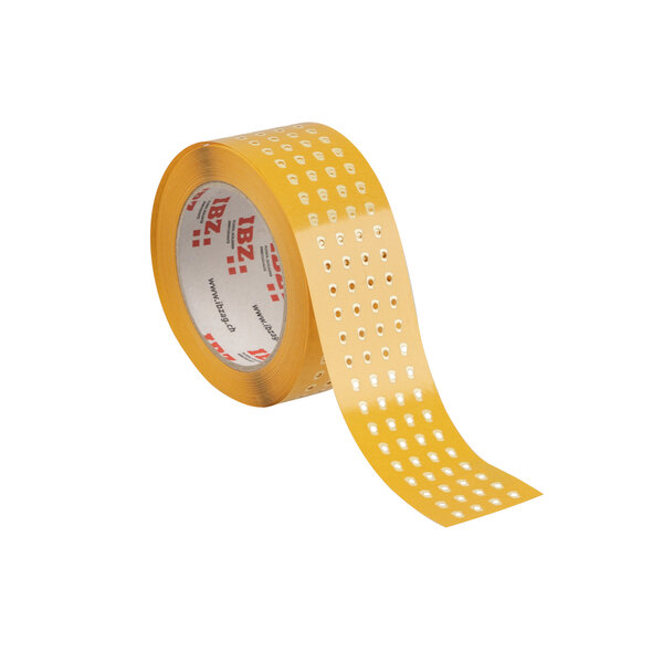 Die Abbildung zeigt Formstanzteile, die aus einseitigem Klebeband in Kleinstteile gestanzt wurden. Der Liner ist gelb, der Hintergrund ist weiss.