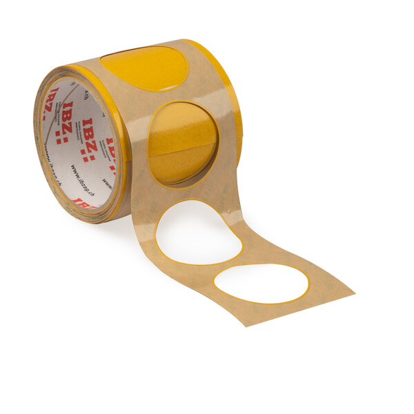 Die Abbildung zeigt selbstklebende Formstanzteile, Rondelle mit schmalem Steg. Der Liner ist braun, der Hintergrund ist weiss.